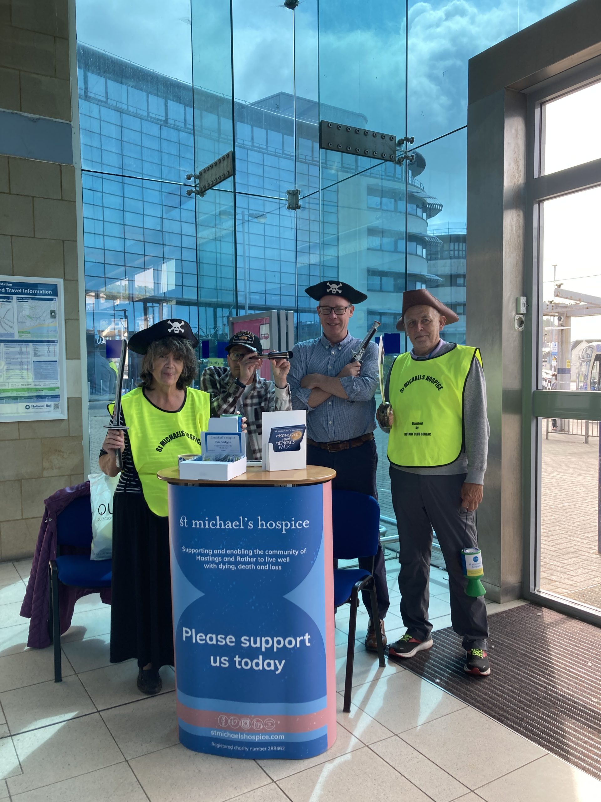 Pirates from the hospice collect at Hastings Station
